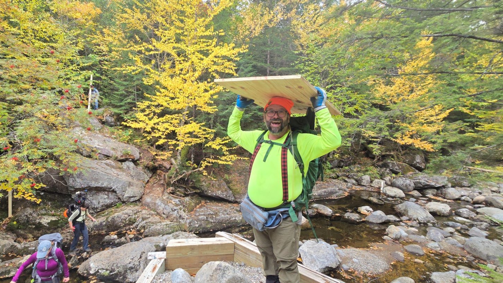 Adam and the group carrying supplies across indian  pass brook